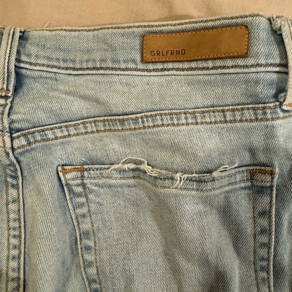 Girlfriend raw hem straight leg jeans